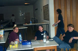 The entrance with the organizer table: Faxe, Dipswitch, Zippy (back) and Mooler. (30.00KB)